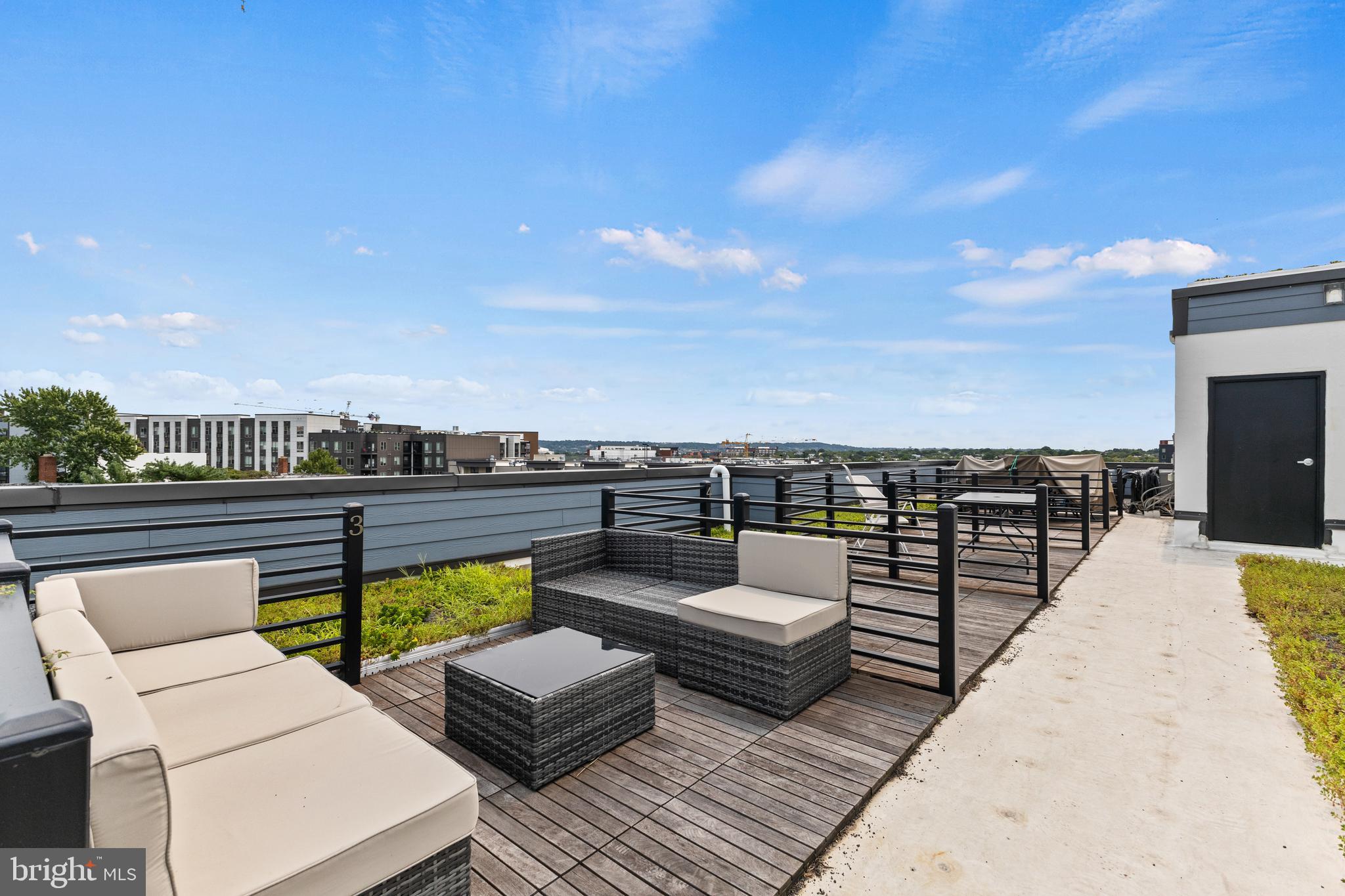 1028 Bladensburg Road Northeast, Unit 37 Washington, DC 20002 - Photo 21 of 29 a view of a terrace with couches