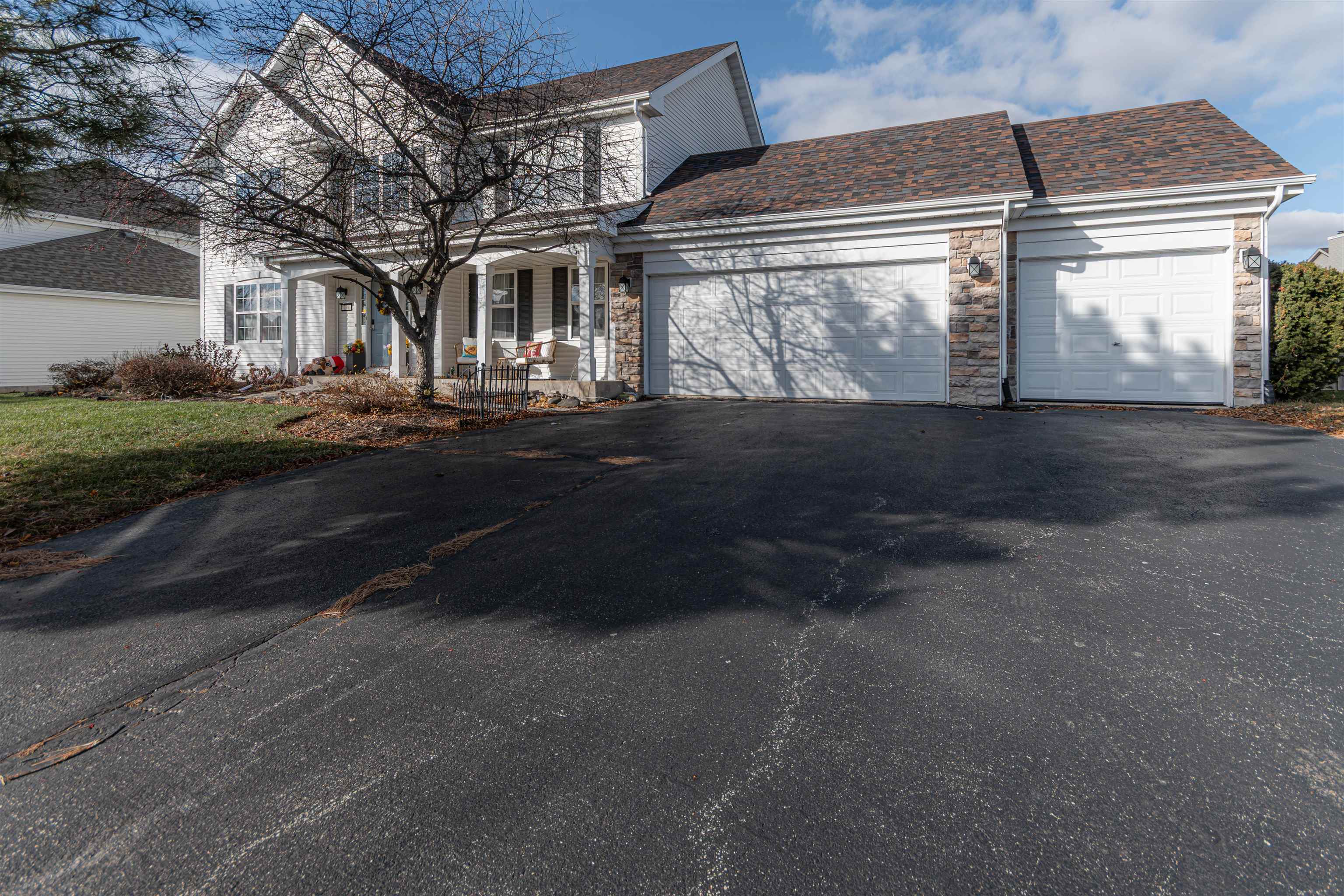 738 Trent Lane Loves Park, IL 61111 - Photo 12 of 37 a front view of a house with a yard