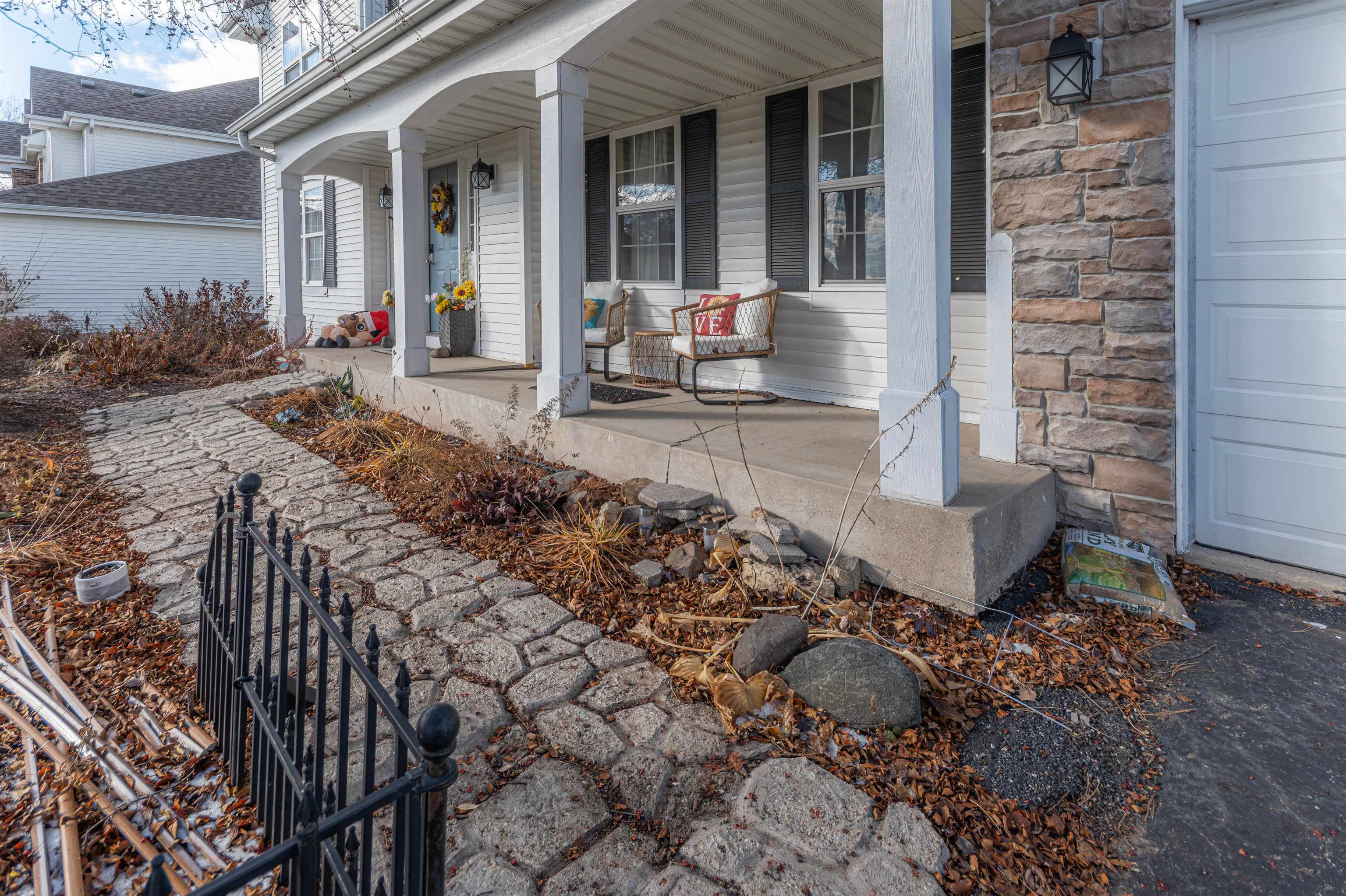 738 Trent Lane Loves Park, IL 61111 - Photo 14 of 37 a front view of a house with outdoor seating
