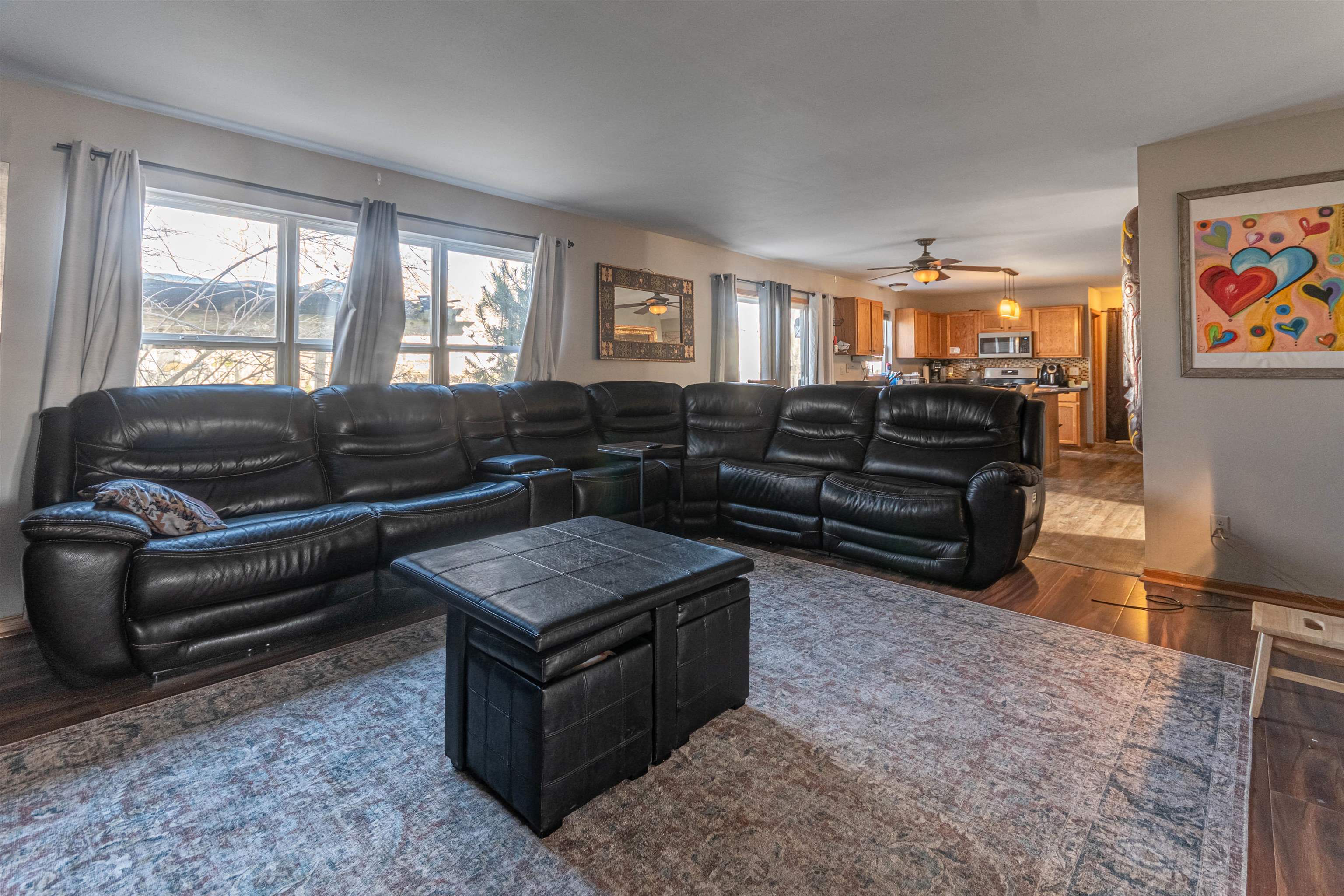 738 Trent Lane Loves Park, IL 61111 - Photo 18 of 37 a living room with furniture and a flat screen tv