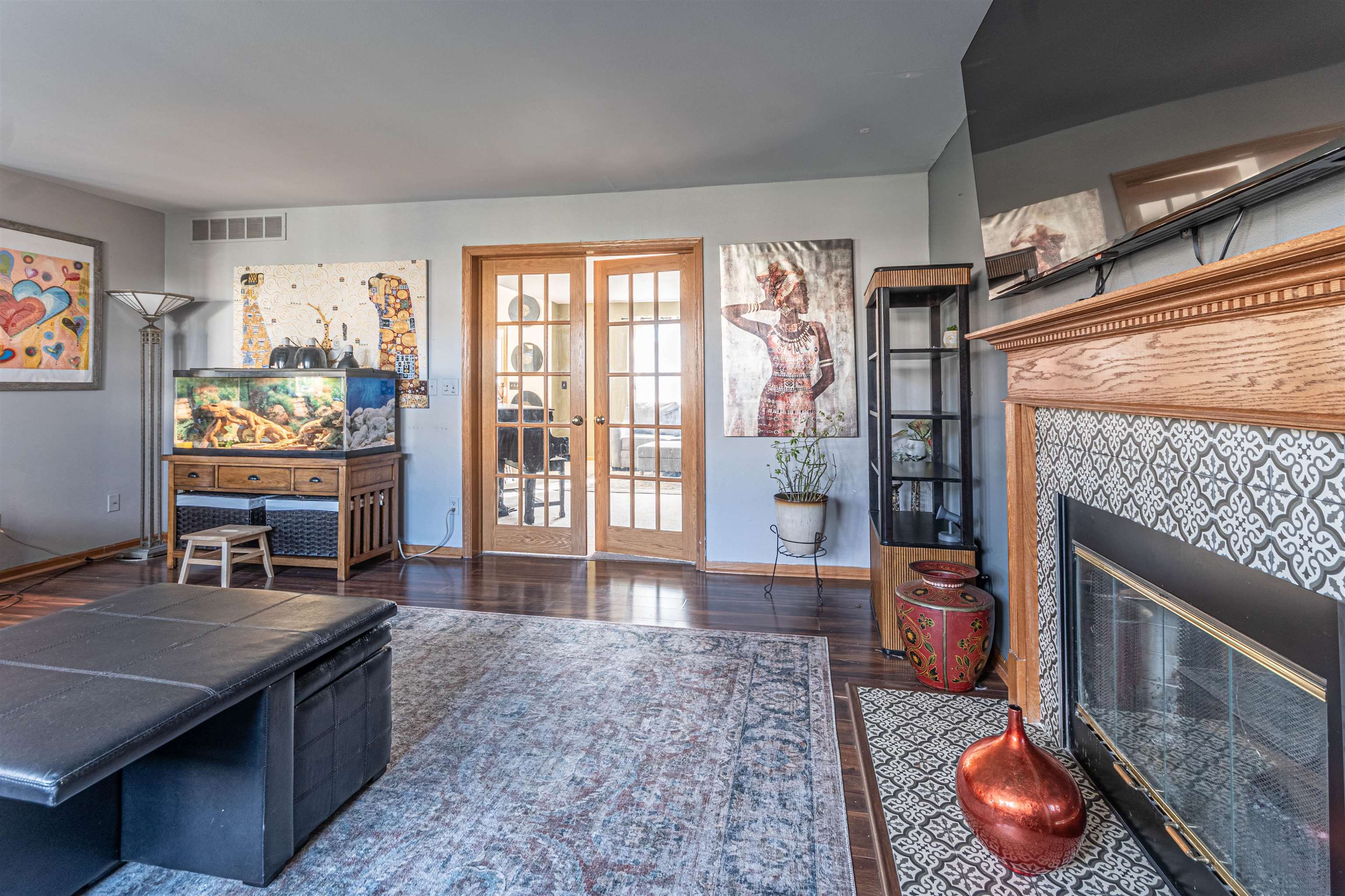 738 Trent Lane Loves Park, IL 61111 - Photo 21 of 37 a living room with furniture a rug and a fireplace