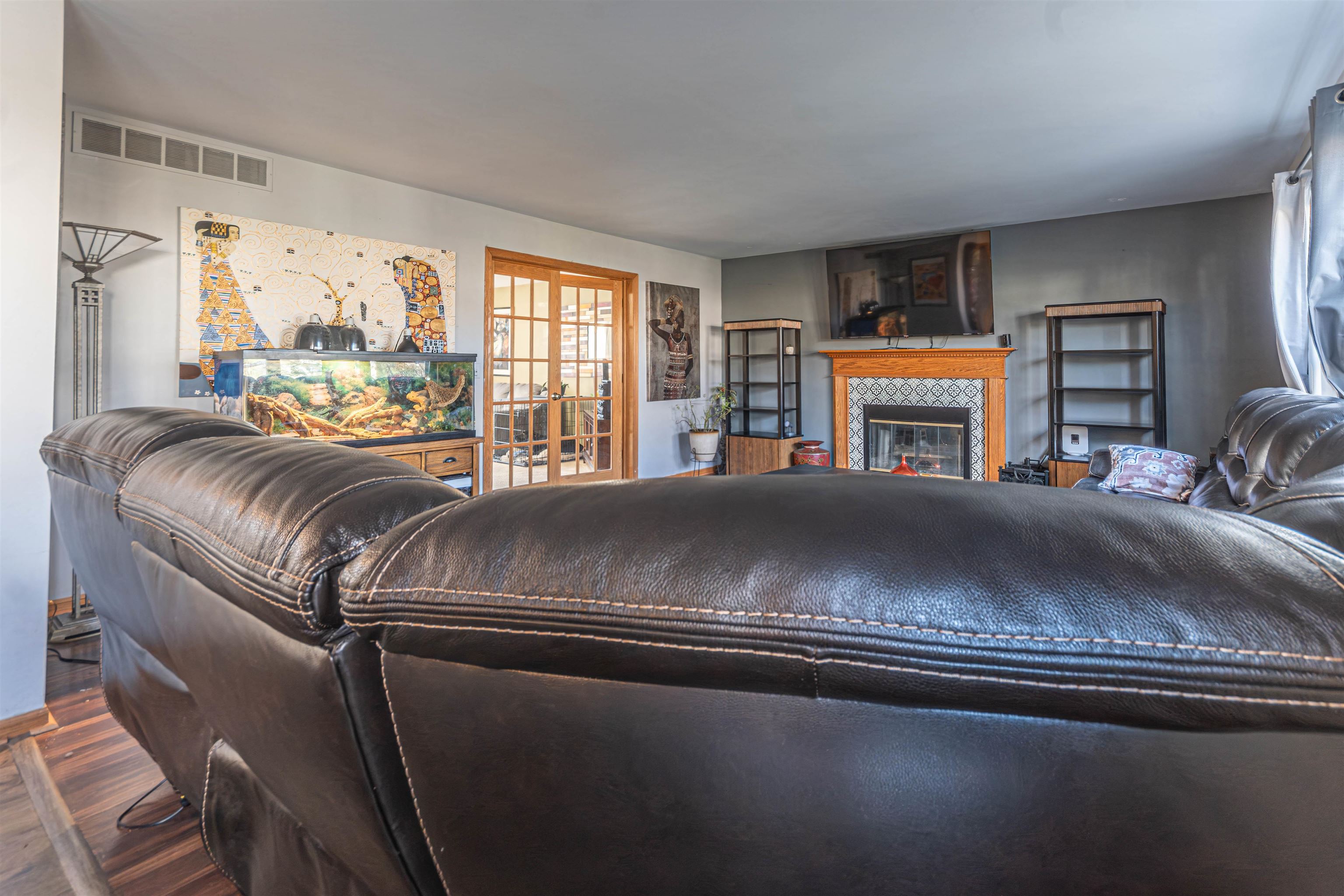 738 Trent Lane Loves Park, IL 61111 - Photo 22 of 37 a living room with a bed furniture and a large window