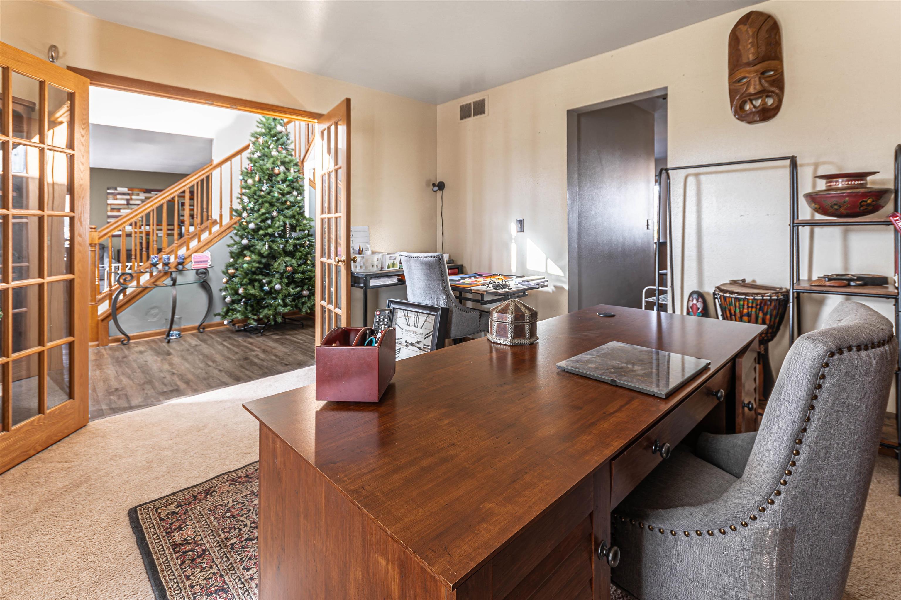 738 Trent Lane Loves Park, IL 61111 - Photo 25 of 37 a dining room with furniture and wooden floor