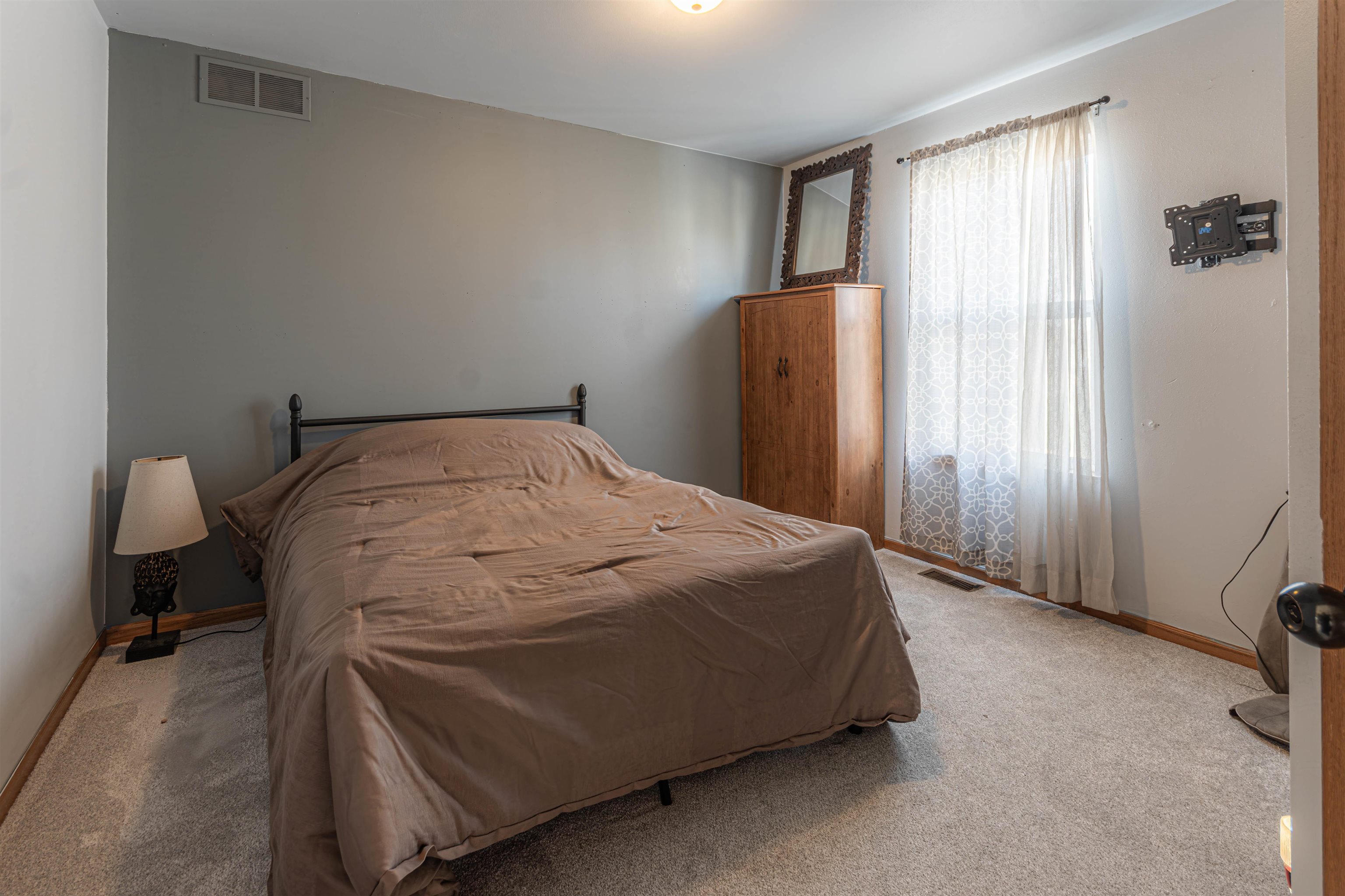 738 Trent Lane Loves Park, IL 61111 - Photo 33 of 37 a bedroom with a bed and a window