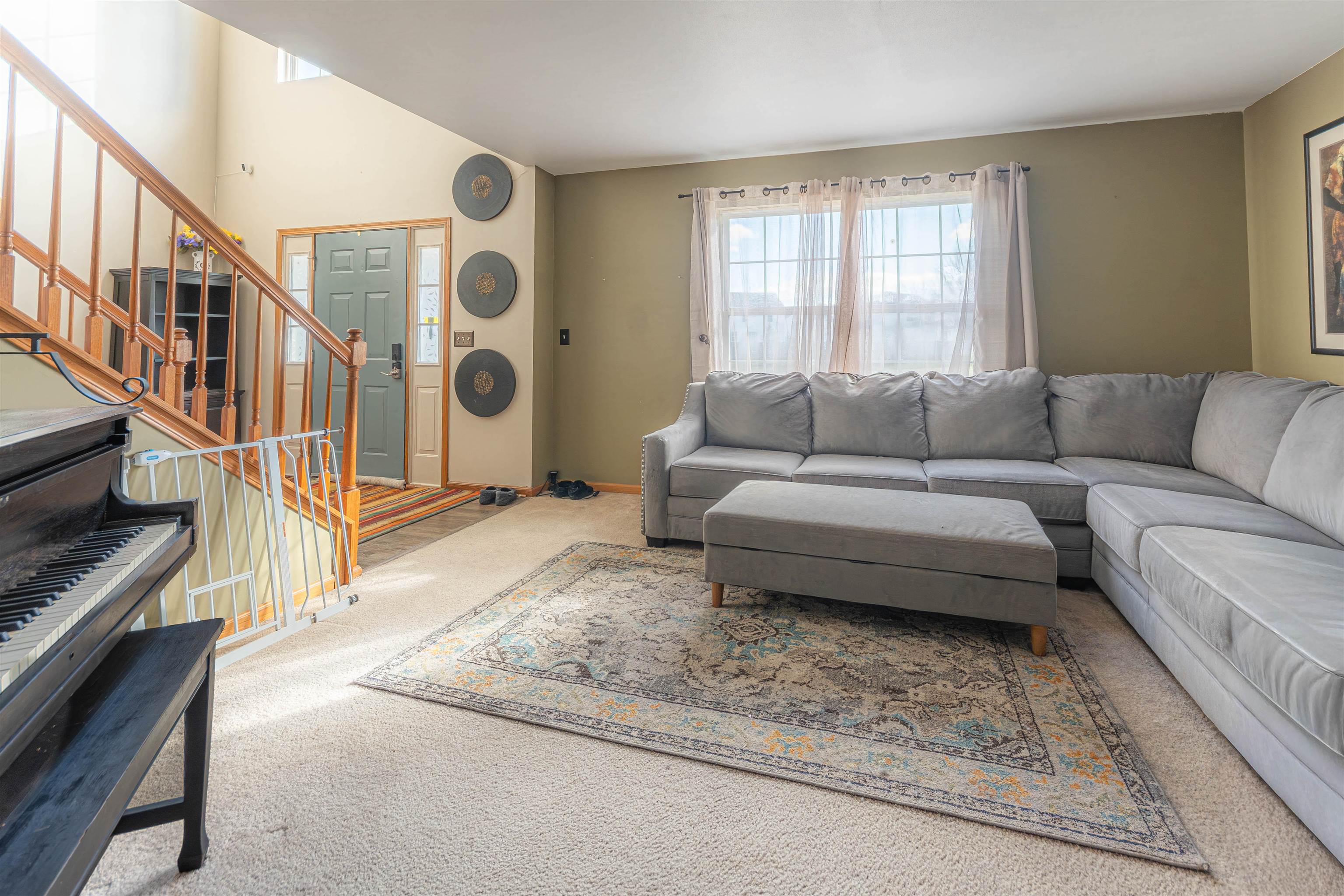 738 Trent Lane Loves Park, IL 61111 - Photo 5 of 37 a living room with furniture and a window