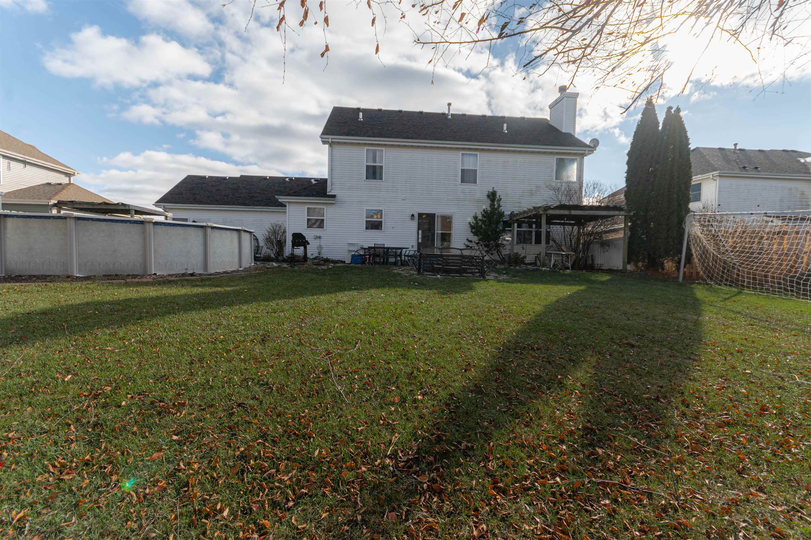 738 Trent Lane Loves Park, IL 61111 - Photo 9 of 37 a view of a backyard with plants and a patio
