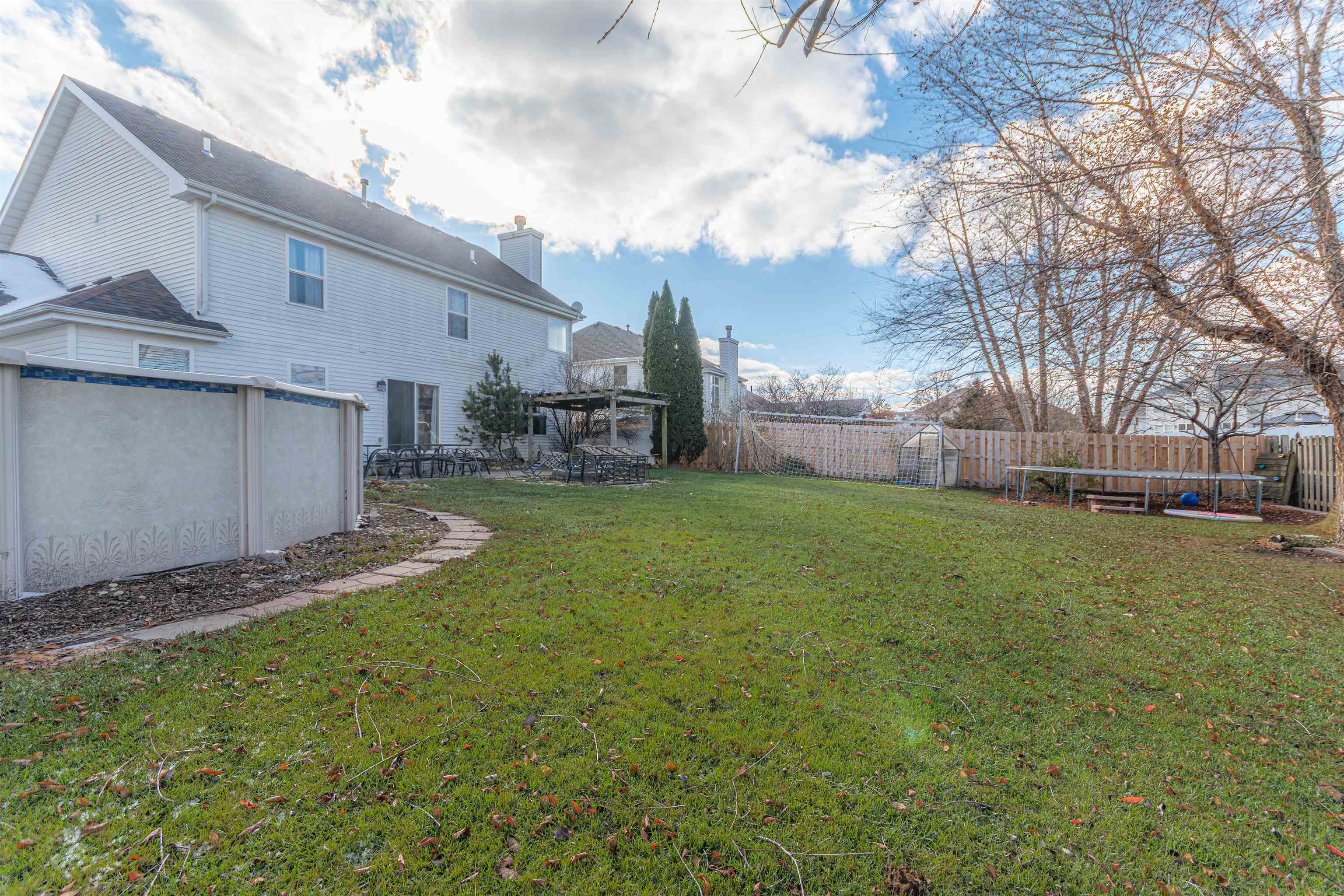 738 Trent Lane Loves Park, IL 61111 - Photo 10 of 37 a view of a back yard of the house