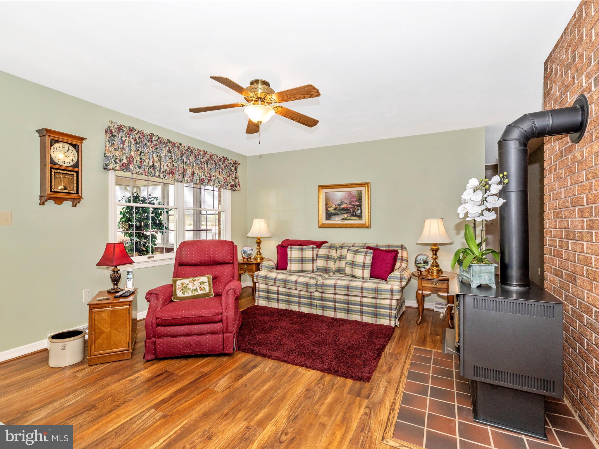 12720 Spickler Road Clear Spring, MD 21722 - Photo 15 of 57 a living room with furniture and wooden floor