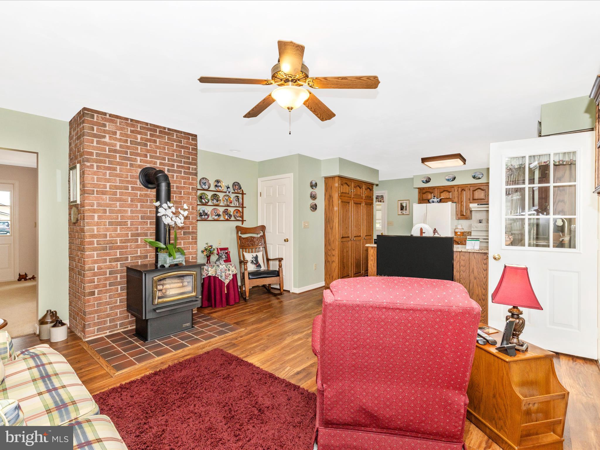 12720 Spickler Road Clear Spring, MD 21722 - Photo 16 of 57 a bedroom with furniture and a chandelier