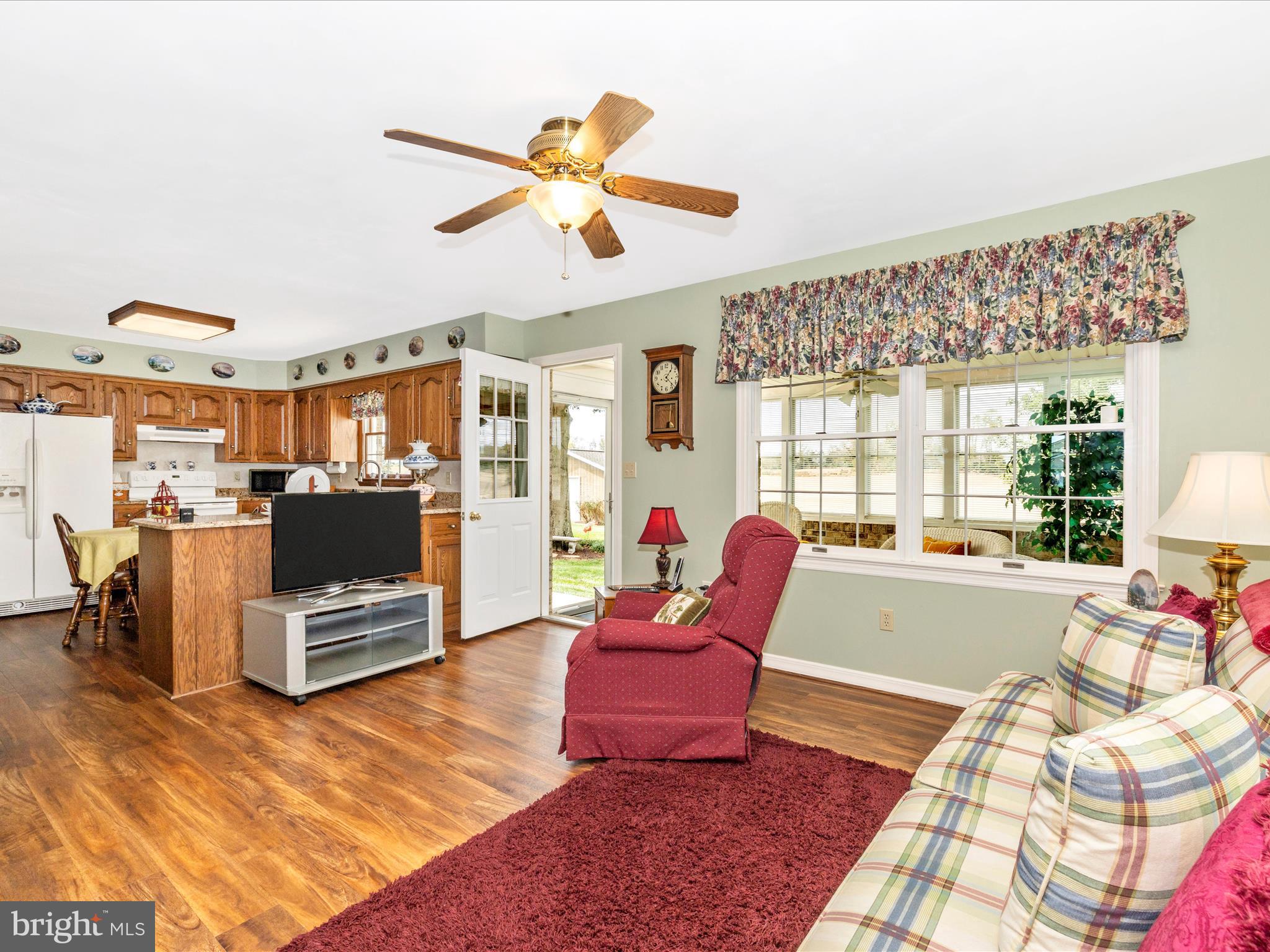 12720 Spickler Road Clear Spring, MD 21722 - Photo 17 of 57 a living room with furniture and a flat screen tv