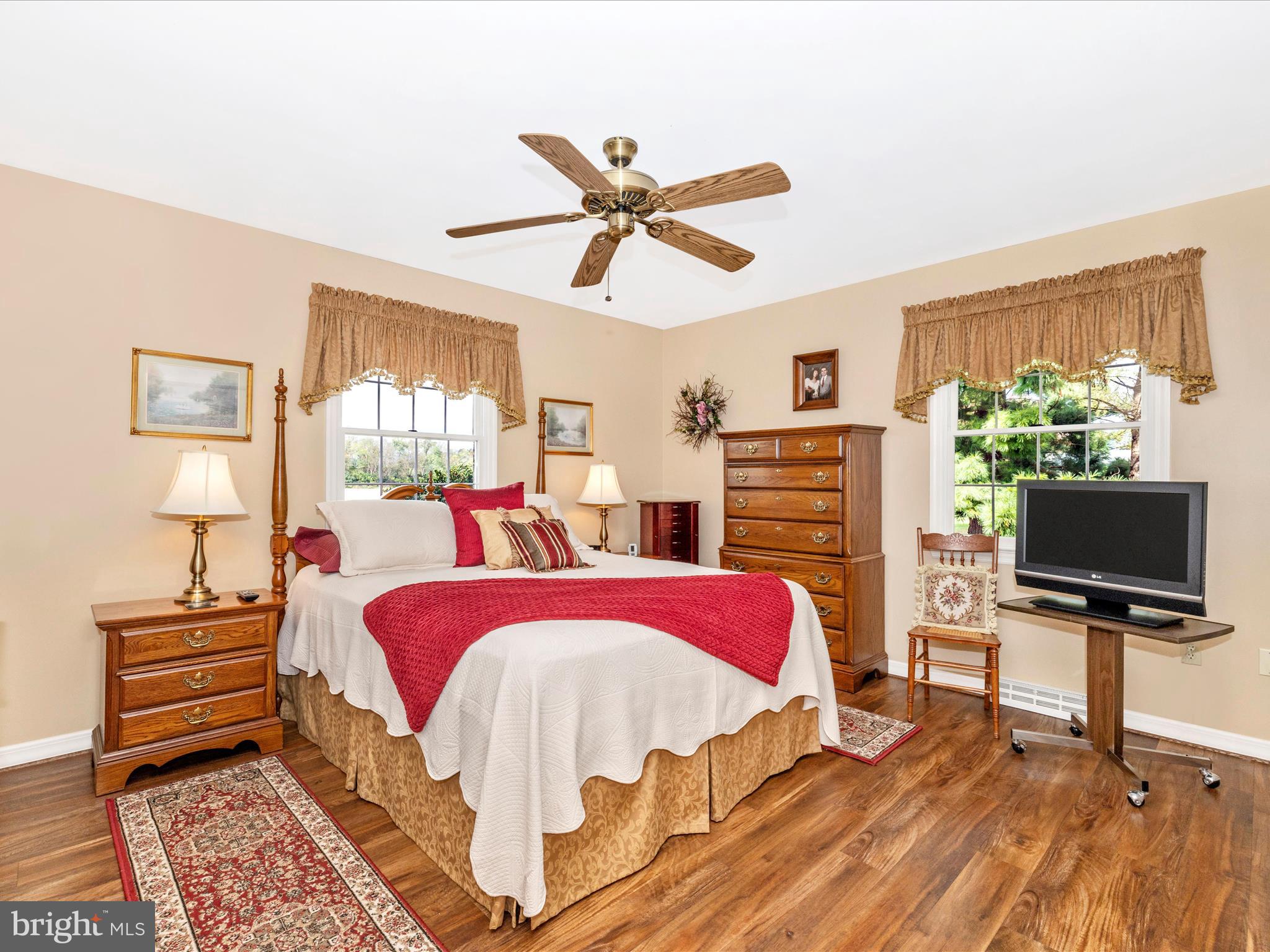 12720 Spickler Road Clear Spring, MD 21722 - Photo 22 of 57 a bed room with bed and a flat screen tv