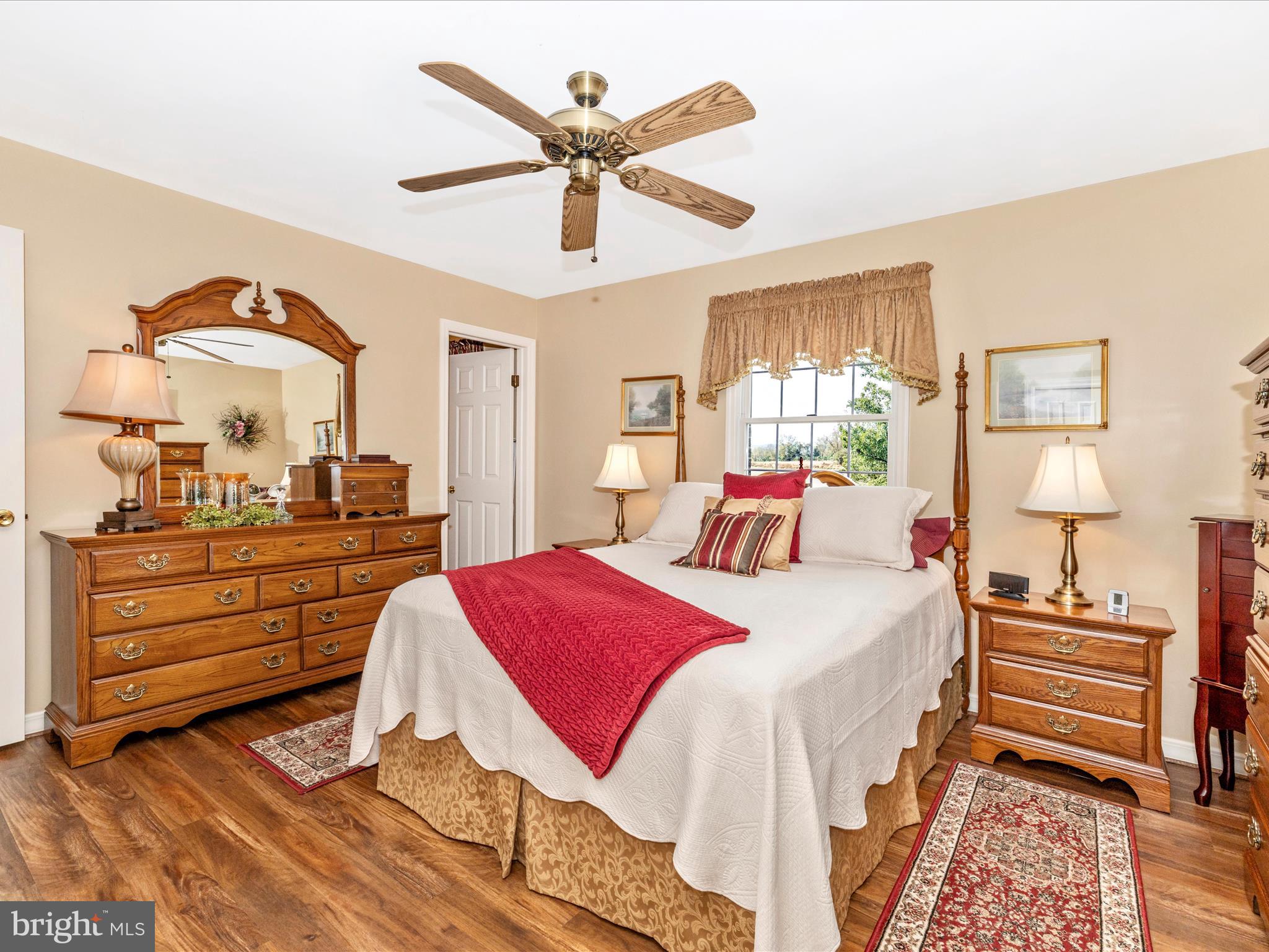 12720 Spickler Road Clear Spring, MD 21722 - Photo 23 of 57 a bedroom with a bed and a dresser