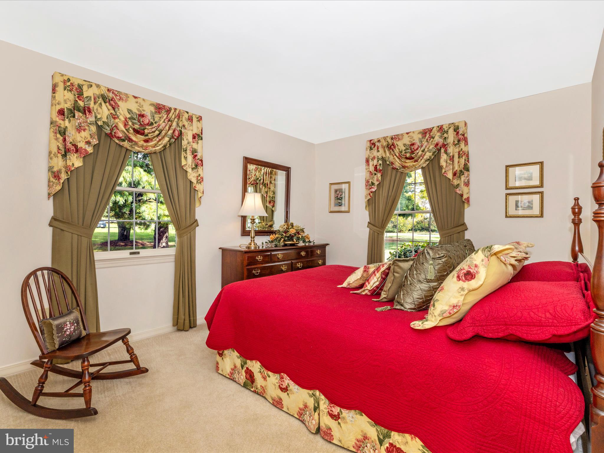 12720 Spickler Road Clear Spring, MD 21722 - Photo 27 of 57 a bedroom with a bed and a chair with the potted plant