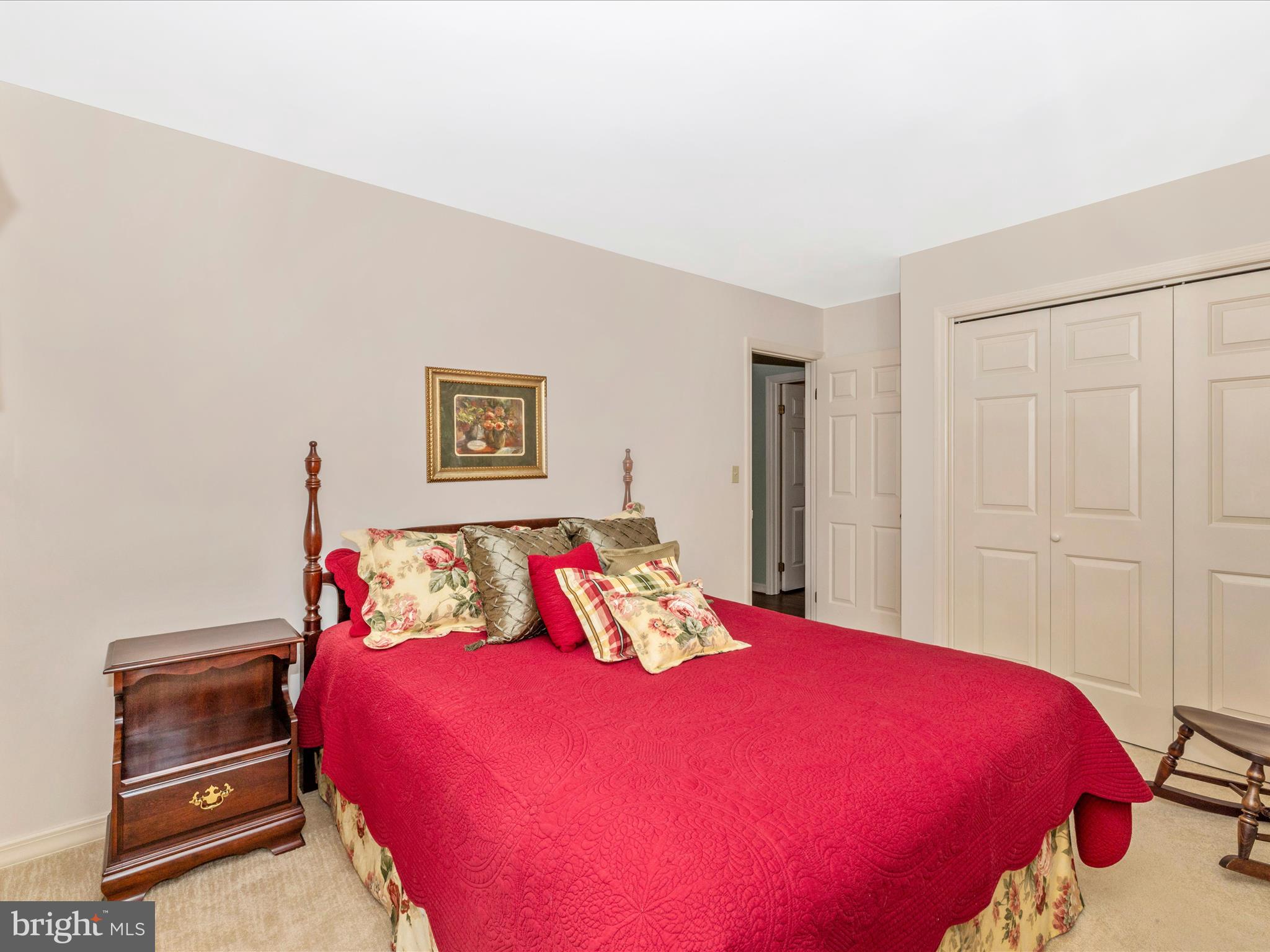 12720 Spickler Road Clear Spring, MD 21722 - Photo 28 of 57 a bedroom with a bed and a closet with rug