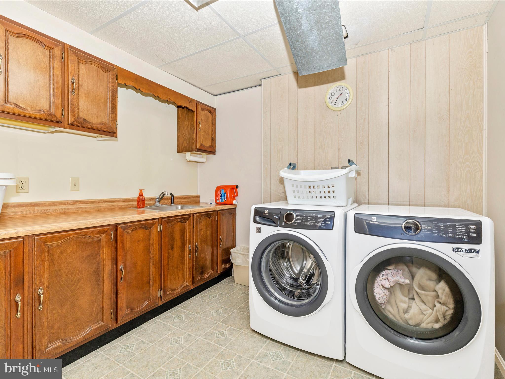 12720 Spickler Road Clear Spring, MD 21722 - Photo 36 of 57 a utility room with sink dryer and washer