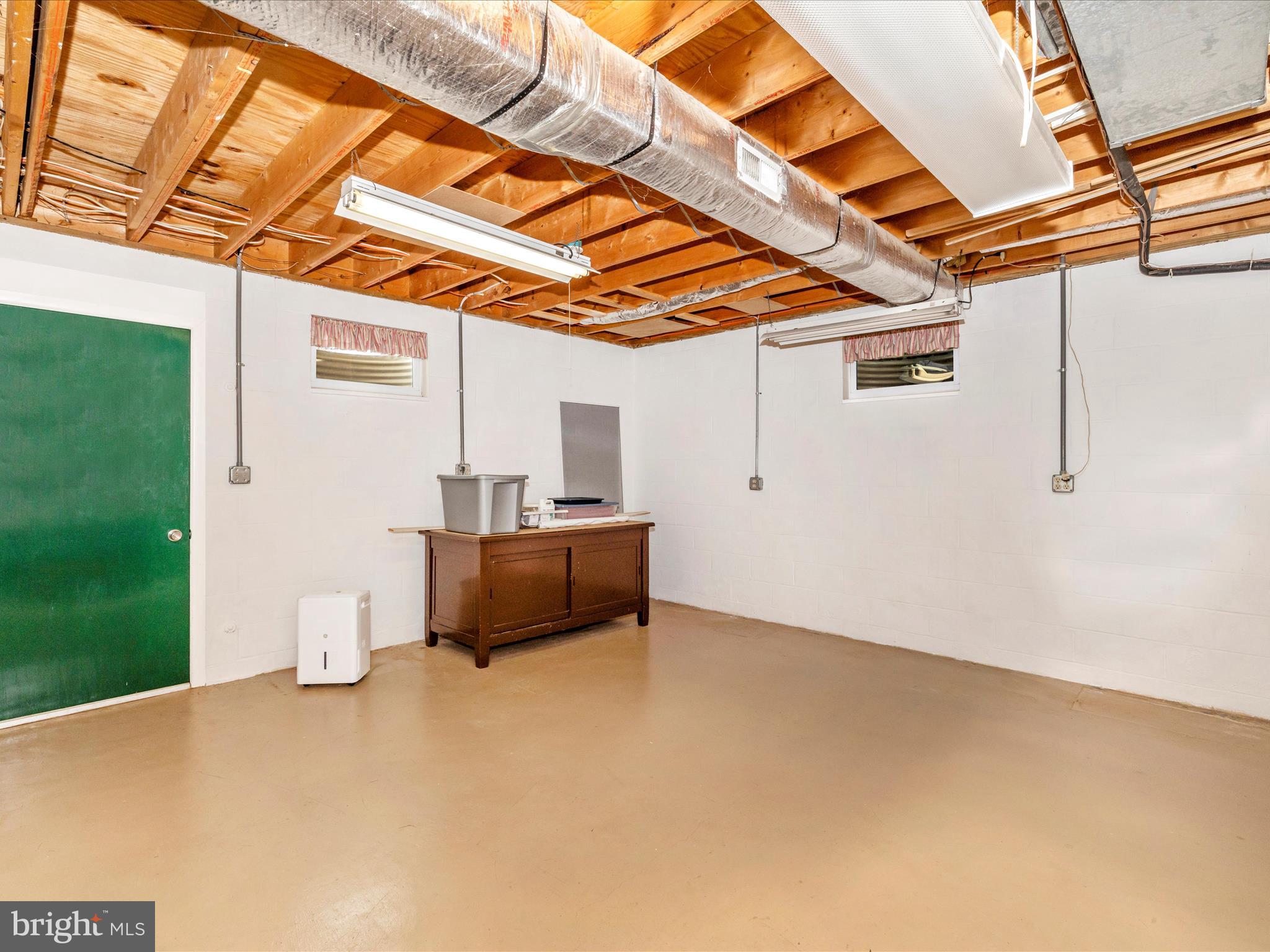 12720 Spickler Road Clear Spring, MD 21722 - Photo 37 of 57 a view of a room with wooden floor and a sink