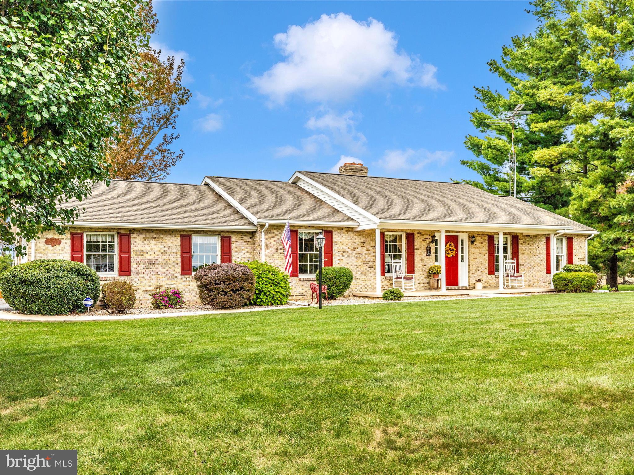 12720 Spickler Road Clear Spring, MD 21722 - Photo 4 of 57 a front view of a house with a yard