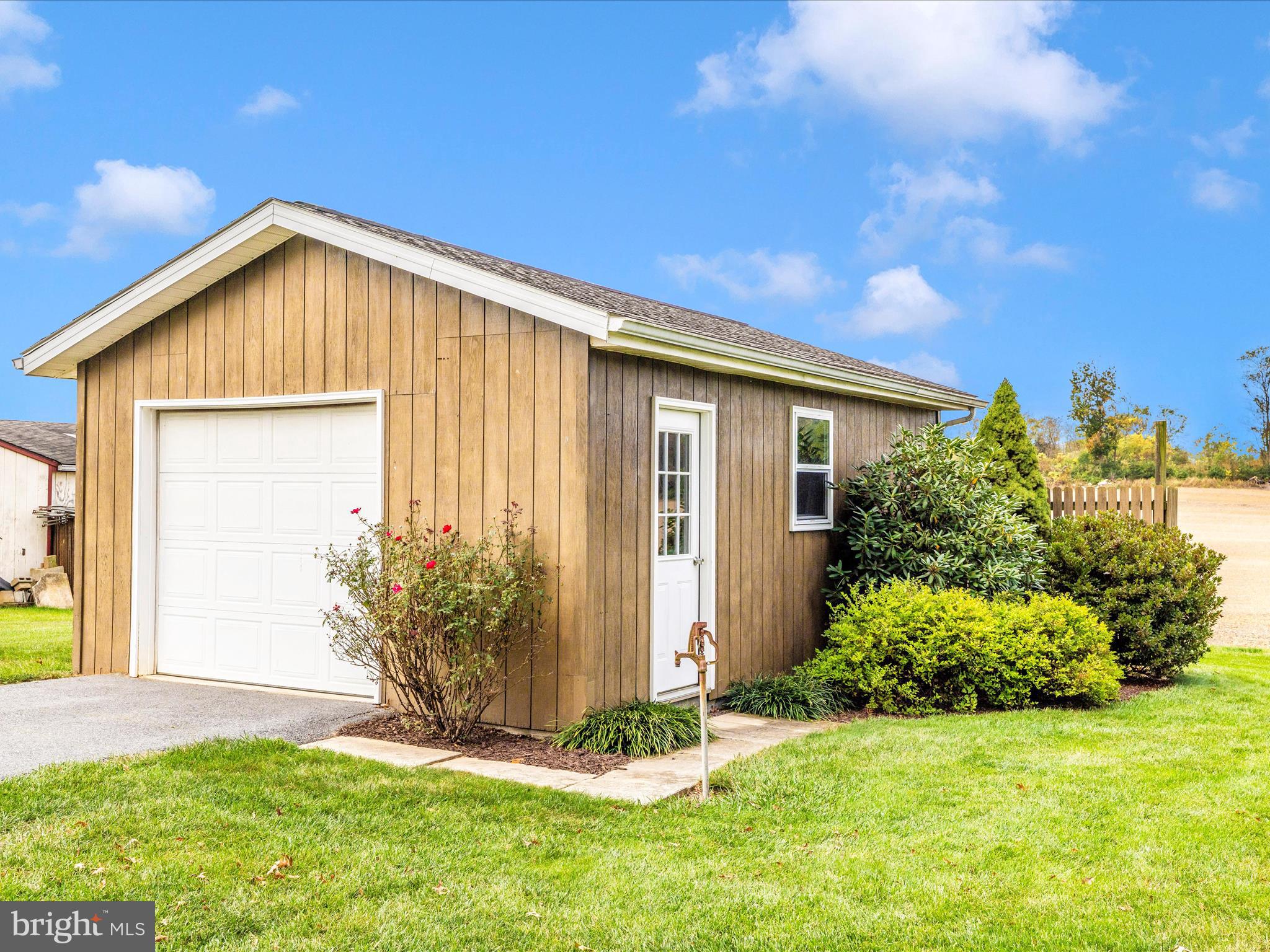 12720 Spickler Road Clear Spring, MD 21722 - Photo 44 of 57 a view of an house with backyard space and garden