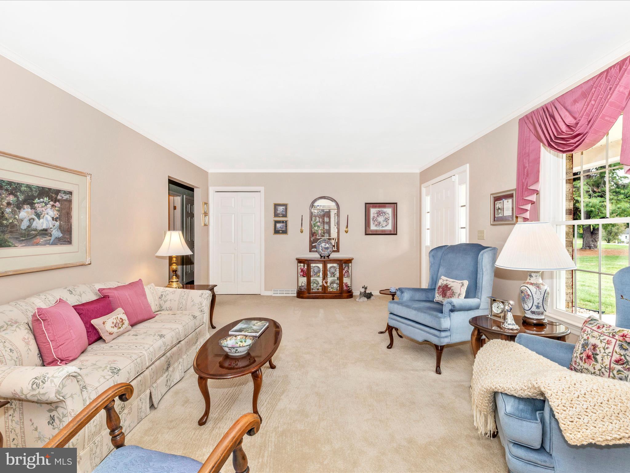 12720 Spickler Road Clear Spring, MD 21722 - Photo 8 of 57 a living room with furniture and a fireplace