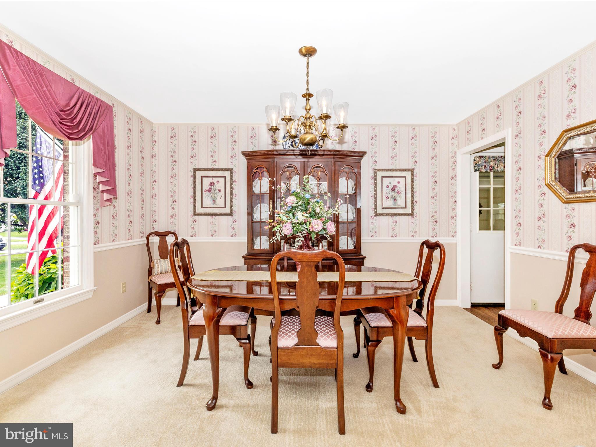 12720 Spickler Road Clear Spring, MD 21722 - Photo 9 of 57 a view of a dining room with furniture and chandelier