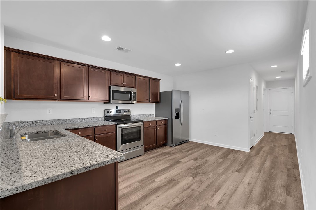 215 Royal Way Pendleton, SC 29670 - Photo 5 of 33 This functional kitchen features ample cabinetry and a clean aesthetic, perfect for everyday living.