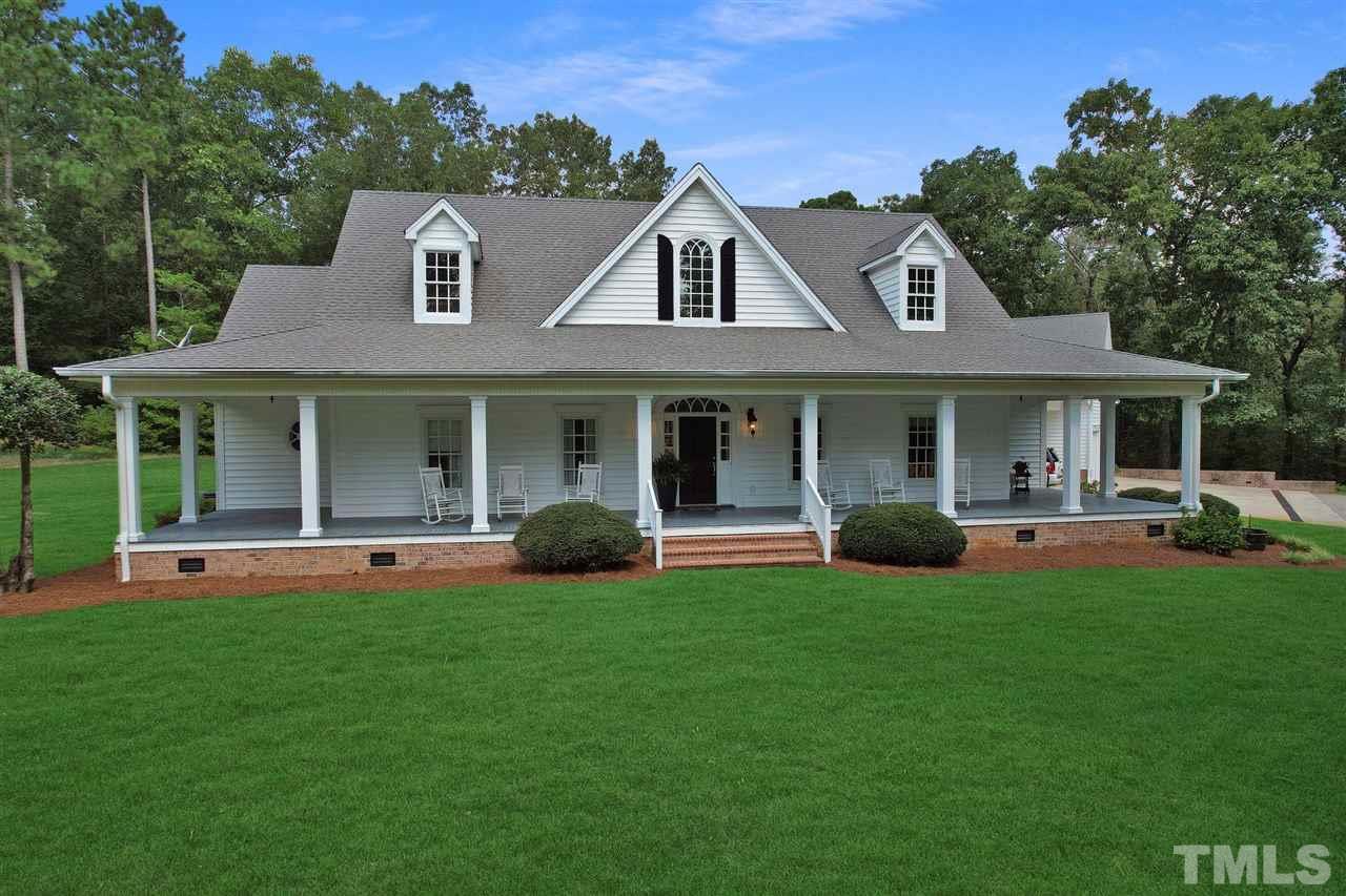 The wide beaded white siding is such a wonderful feel of country living...