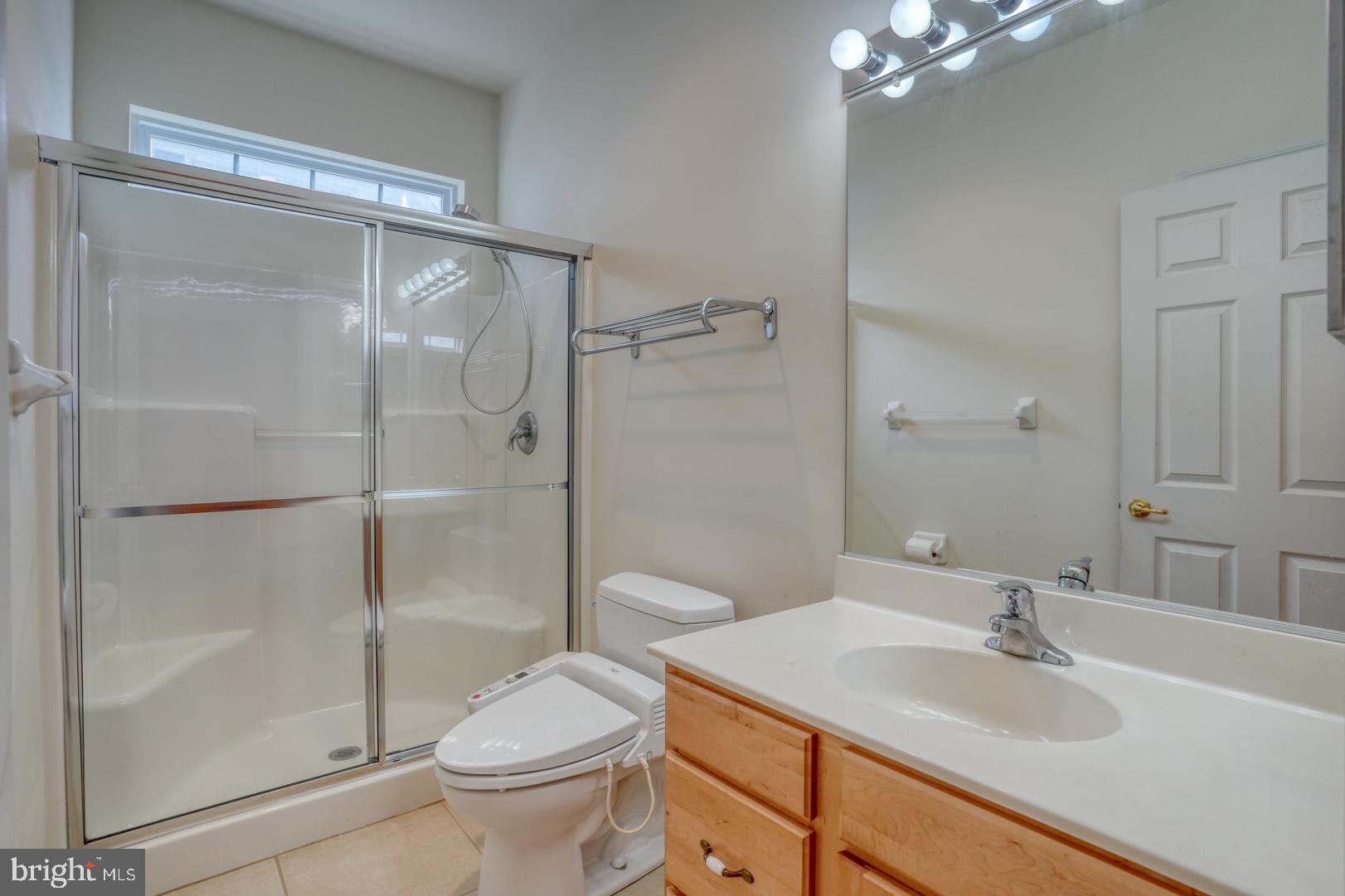 78 Springmill Drive Middletown, DE 19709 - Photo 25 of 60 a bathroom with a sink toilet and shower