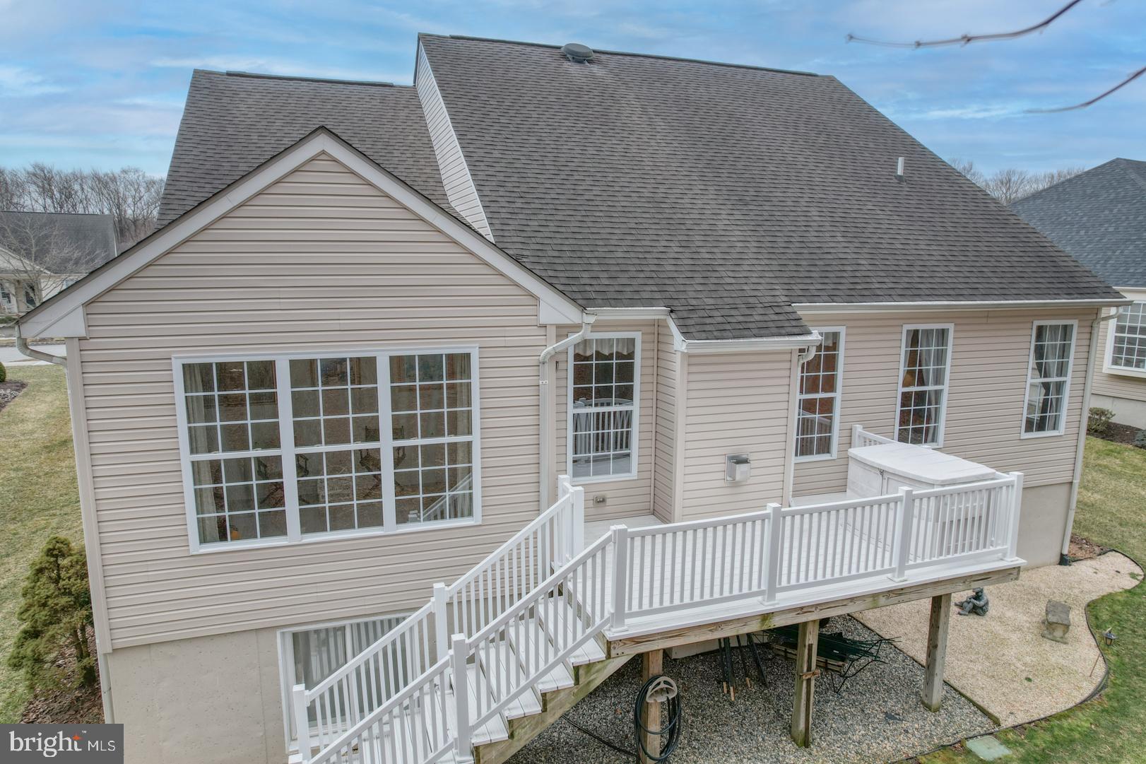 78 Springmill Drive Middletown, DE 19709 - Photo 3 of 60 a view of a house with a wooden deck and furniture