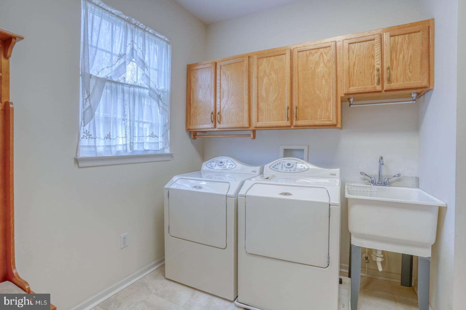 78 Springmill Drive Middletown, DE 19709 - Photo 35 of 60 a utility room with dryer and washer