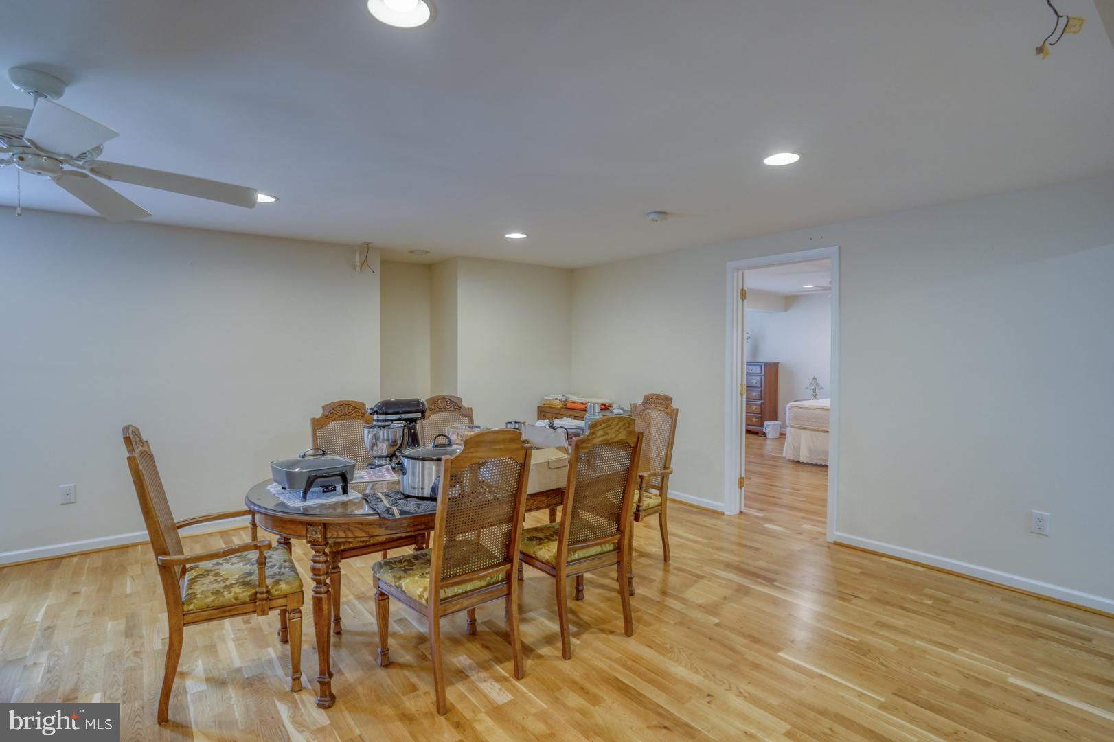 78 Springmill Drive Middletown, DE 19709 - Photo 45 of 60 a view of a dining room with furniture and wooden floor