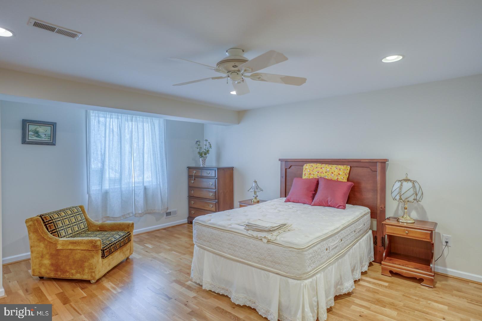 78 Springmill Drive Middletown, DE 19709 - Photo 50 of 60 a bedroom with a bed and a couch