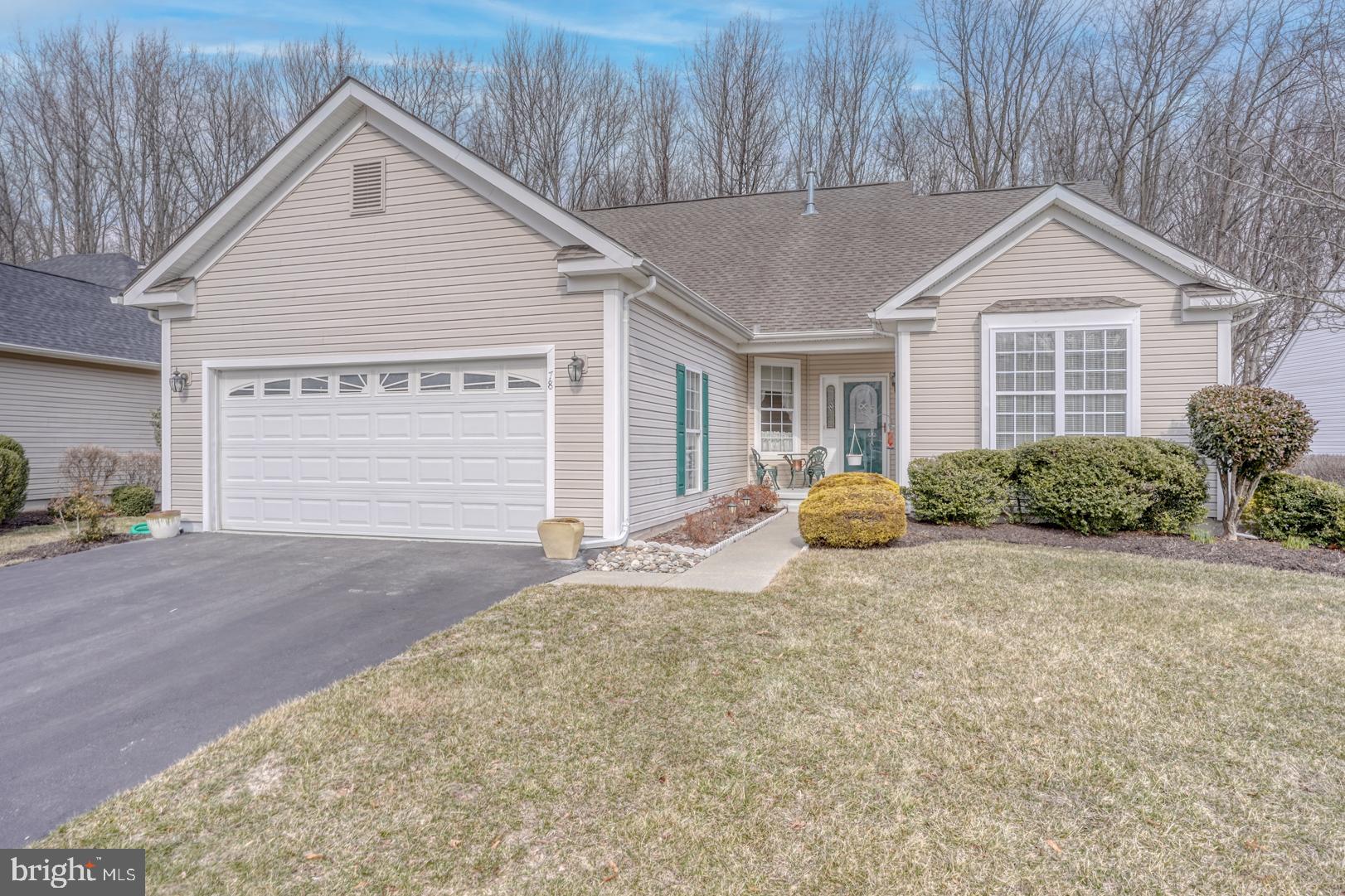 78 Springmill Drive Middletown, DE 19709 - Photo 56 of 60 a view of a house with a yard and garage