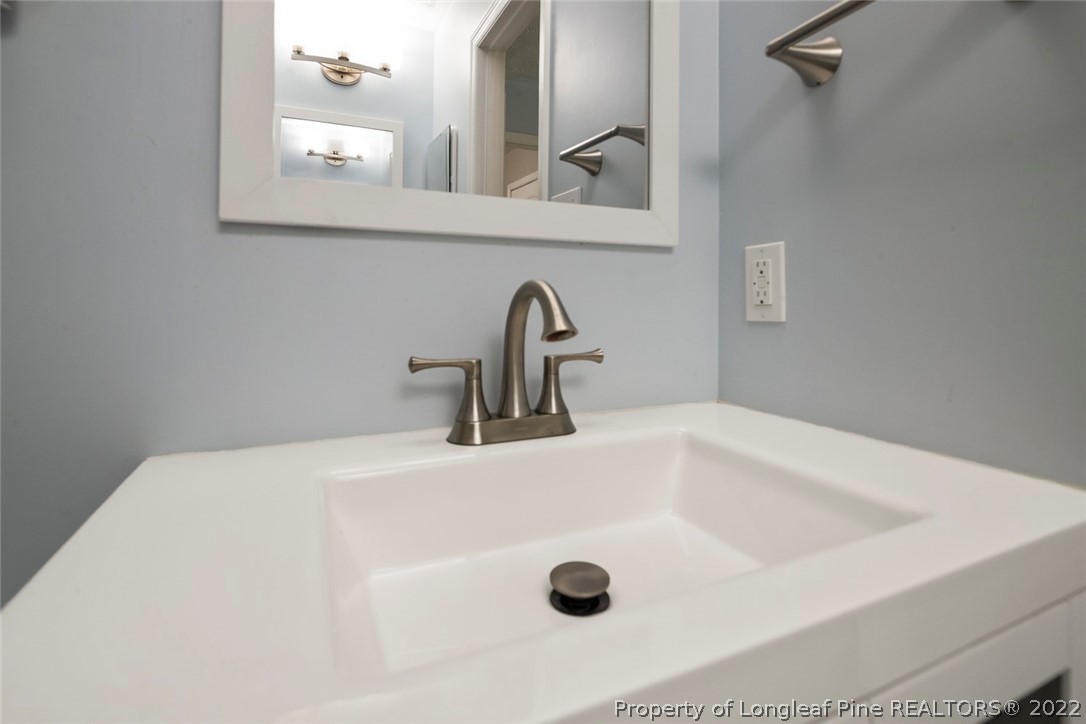 8209 Rockfish Road Raeford, NC 28376 - Photo 14 of 42 a close view of a sink and a faucet
