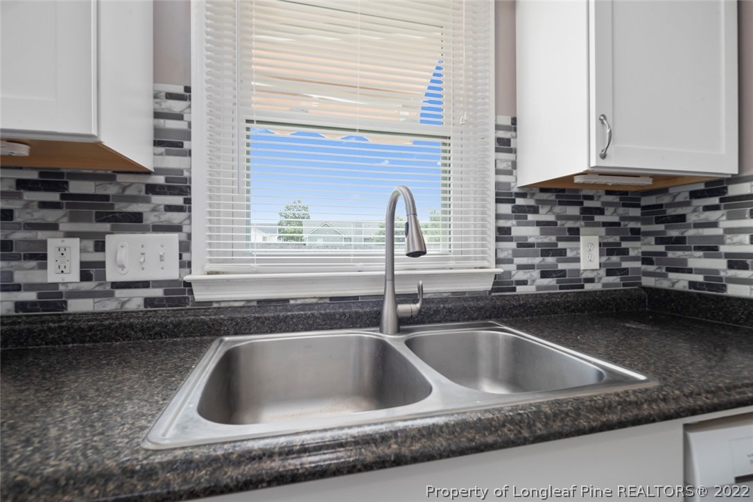 8209 Rockfish Road Raeford, NC 28376 - Photo 30 of 42 a close view of sink and tap