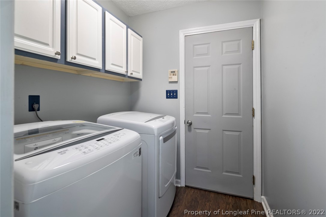 8209 Rockfish Road Raeford, NC 28376 - Photo 32 of 42 a utility room with dryer and washer