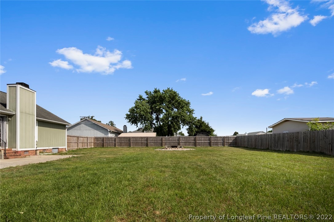 8209 Rockfish Road Raeford, NC 28376 - Photo 37 of 42 a view of a house with a big yard
