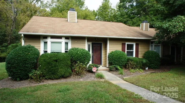 a view of a house with garden