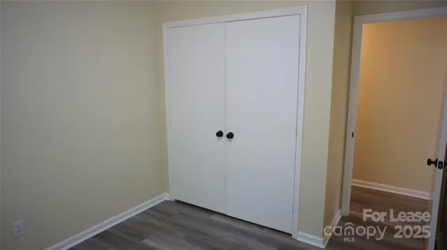 a view of small space with wooden floor