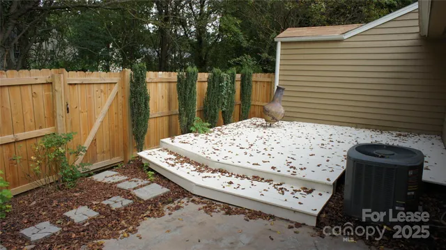 a view of a balcony with chairs