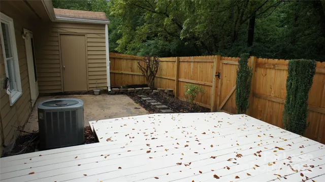 a view of a backyard of the house