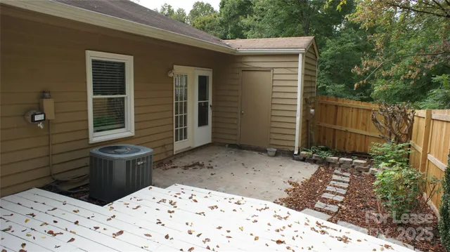 a view of a backyard of the house