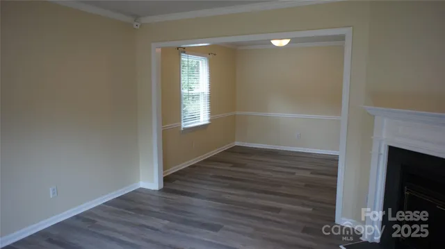 a view of livingroom with hardwood floor and window