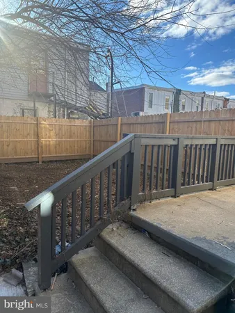 a balcony with wooden floor