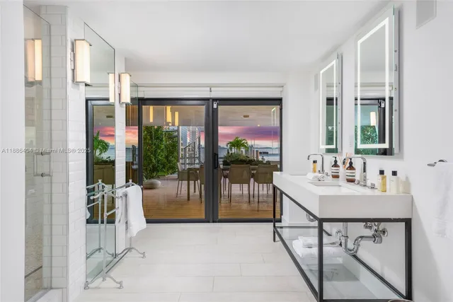 a view of a livingroom with furniture window and wooden floor
