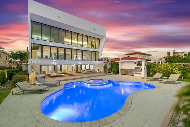 a view of swimming pool with outdoor seating