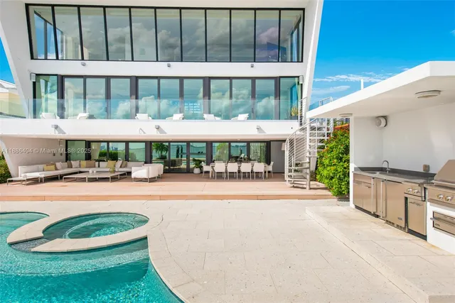 a view of a swimming pool with a patio