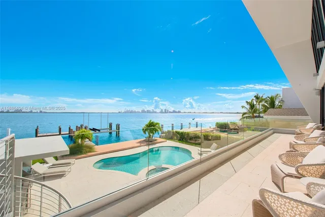 swimming pool view with seating space