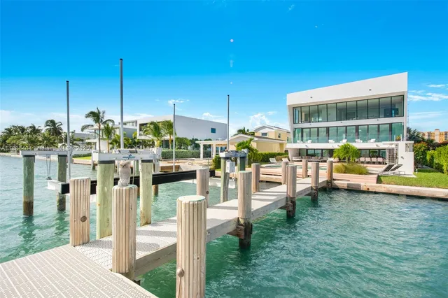 a view of a chair and tables in the patio