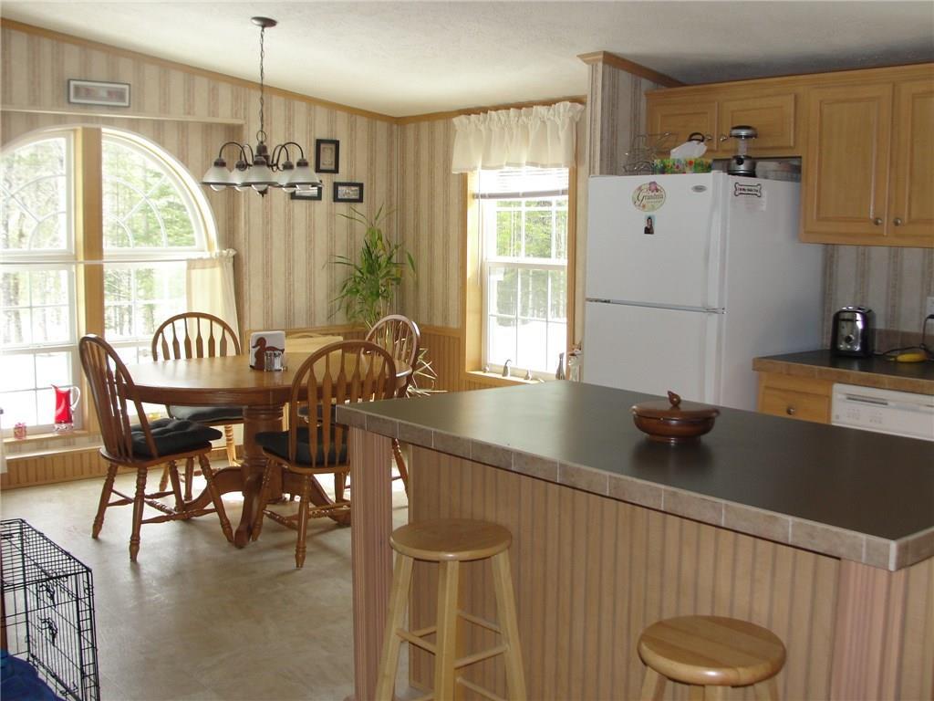 256 Rice Road Waterford, ME 04088 - Photo 13 of 35 This view shows the dining end of...