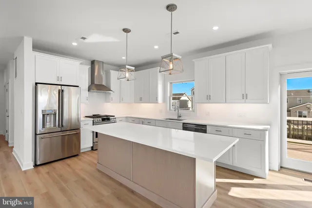 a view of city with ocean